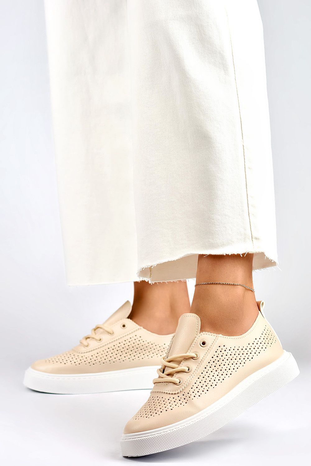 Stylish and versatile Eco-friendly Leather Sneakers for Women in muted beige, perfect for spring and summer outings.