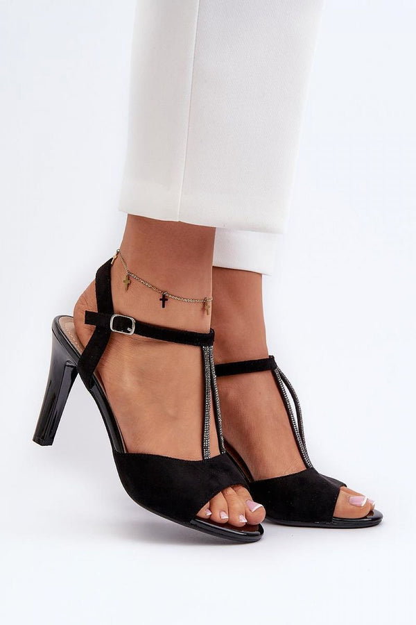 Sophisticated and stylish, these Elegant Black Heeled Sandals with Straps for Women elevate any outfit effortlessly.