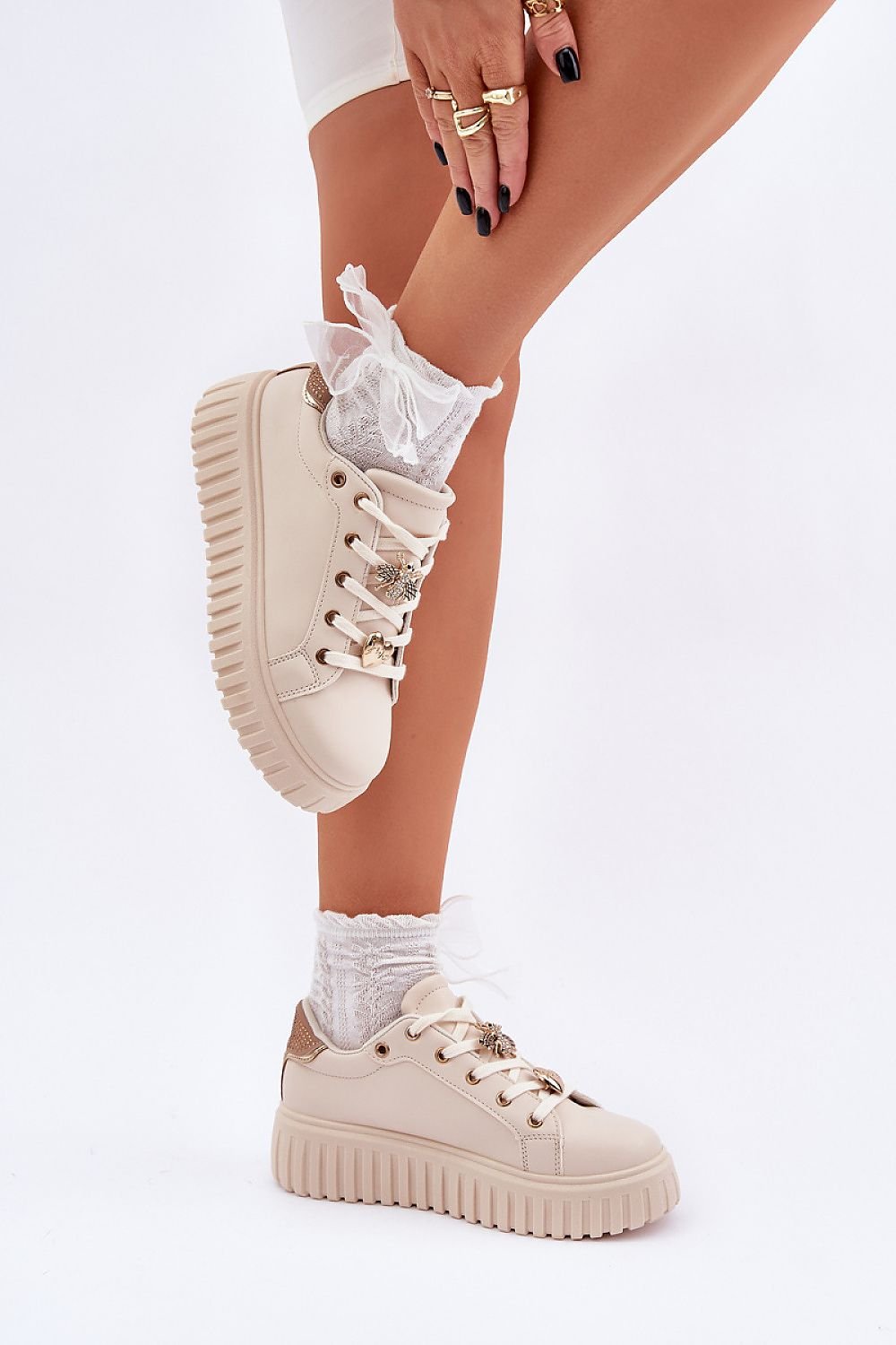 Stylish Women's Sneakers with Platform and Cute Pins feature eco-friendly leather and adorable pins for a trendy look.