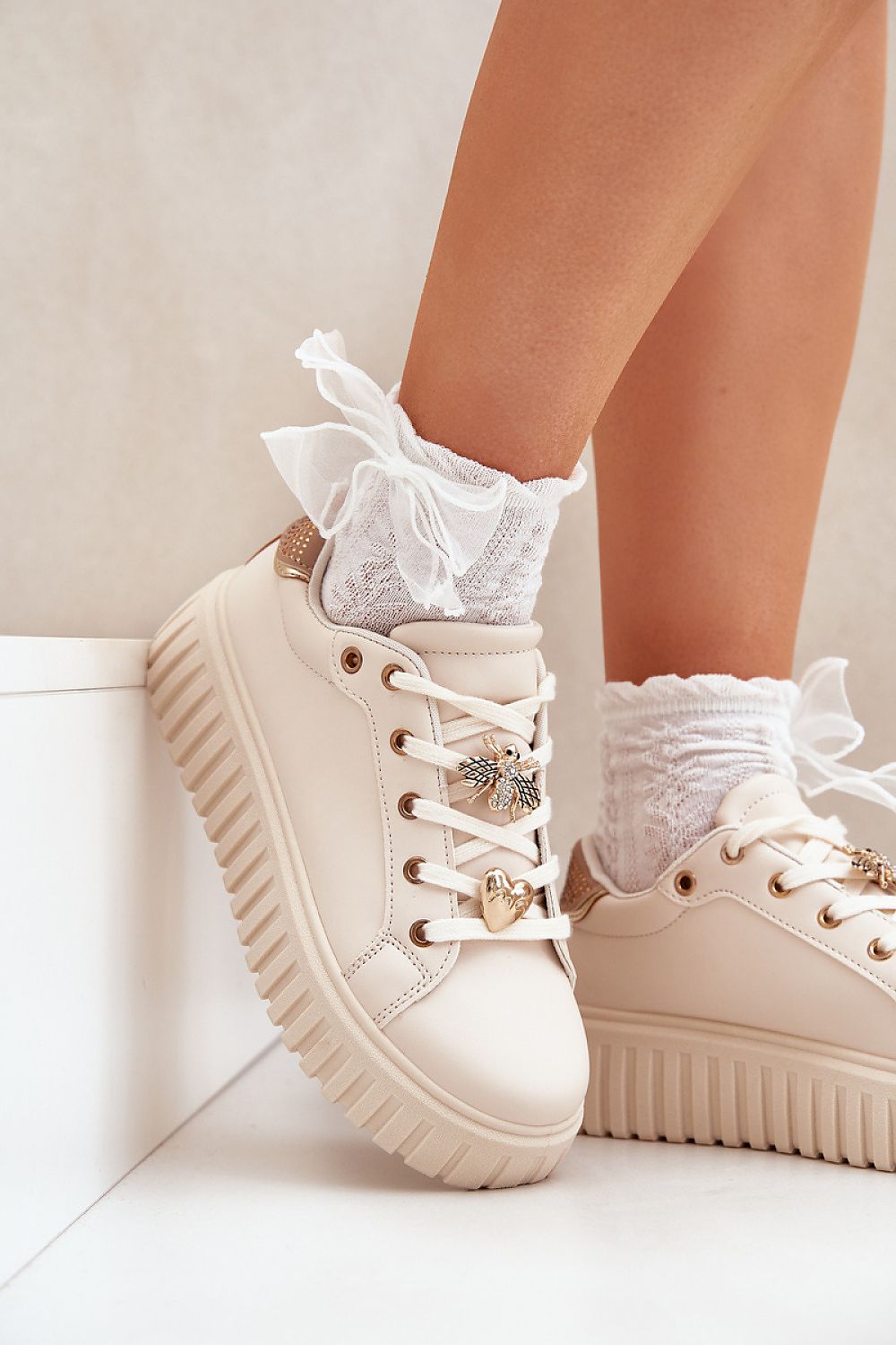 Stylish Women's Sneakers with Platform and Cute Pins feature eco-friendly leather and unique decorative pins for flair.