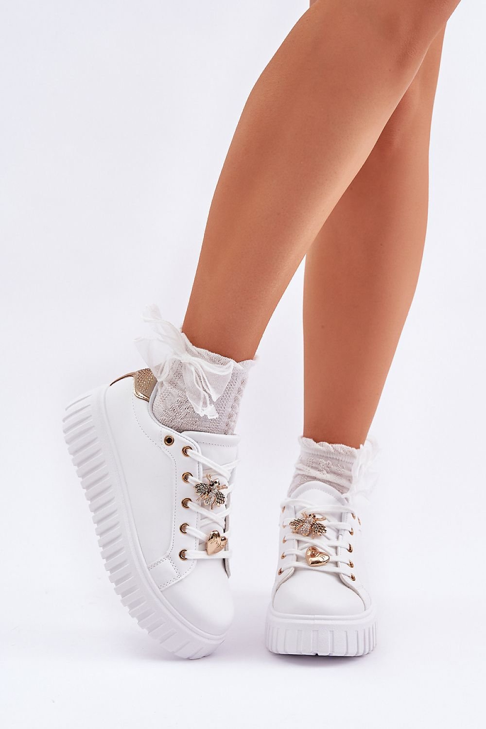 Stylish Women's Sneakers with Platform and Cute Pins, featuring eco-friendly leather and charming decorative pins.