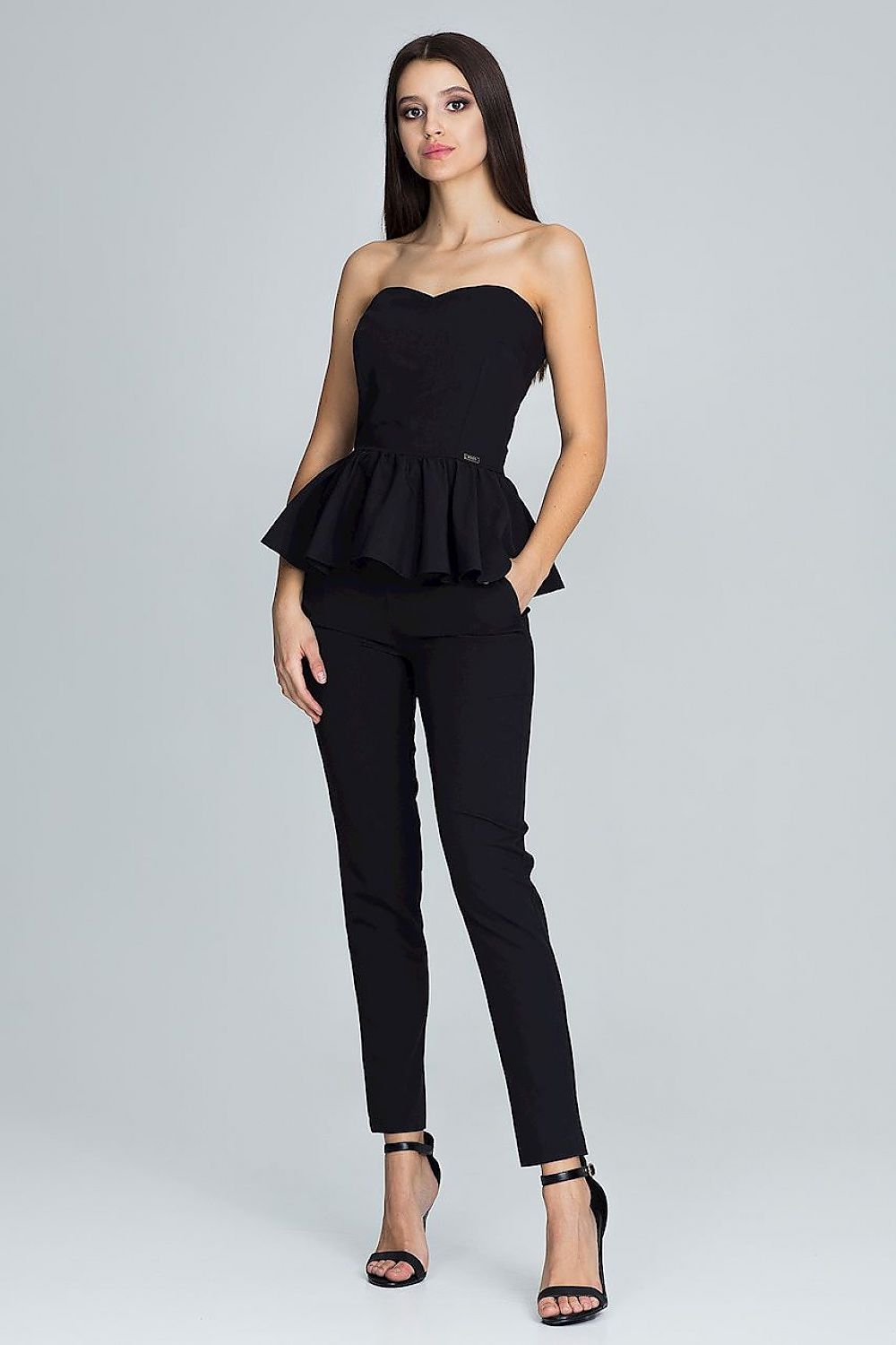 Stylish model showcasing the Elegant Women's Trousers And Corset Set For Stylish Look, perfect for any occasion.