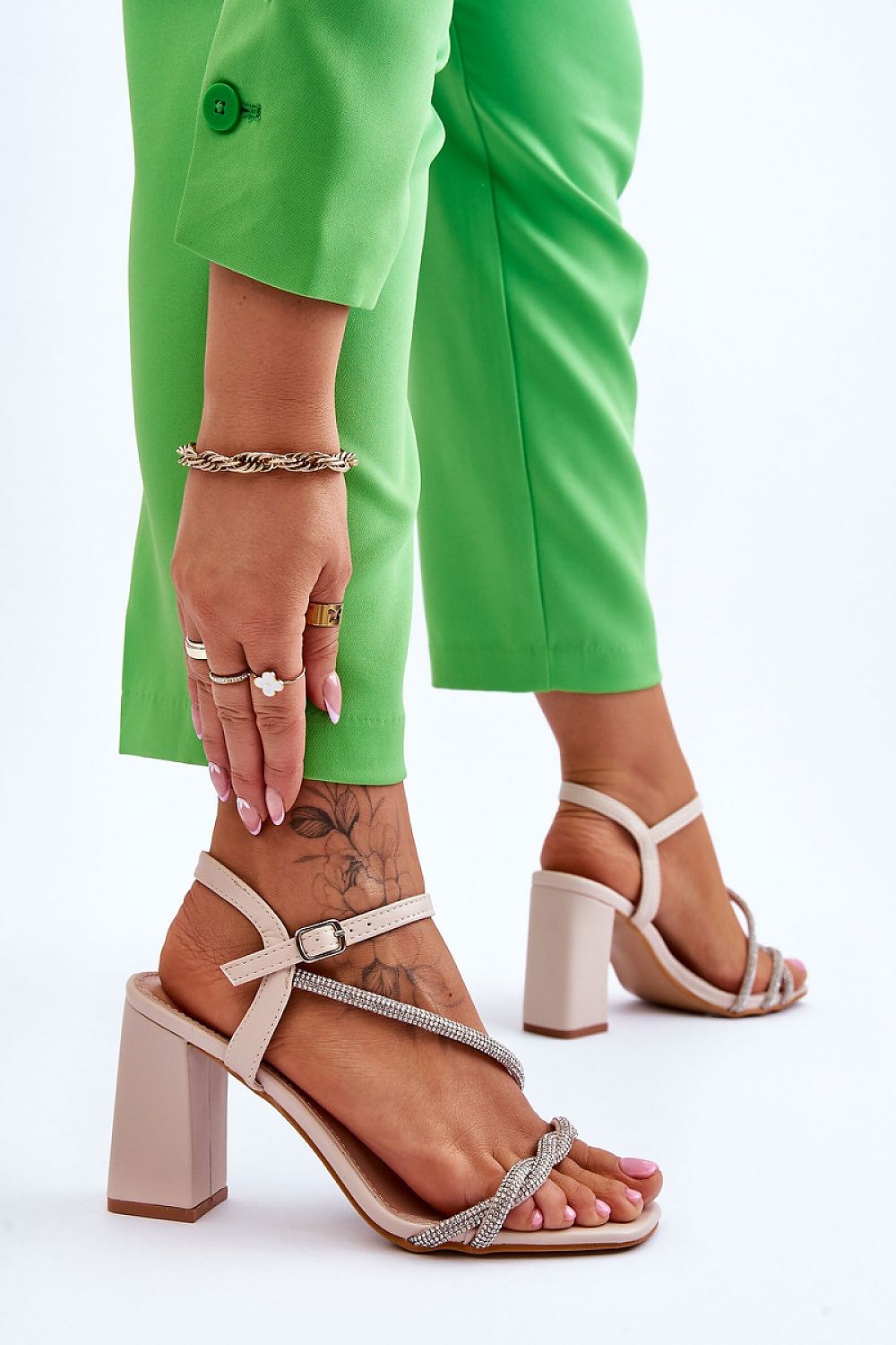 Step out in style with Stylish Eco Leather Block Heel Sandals with Rhinestone Straps for comfort and elegance.