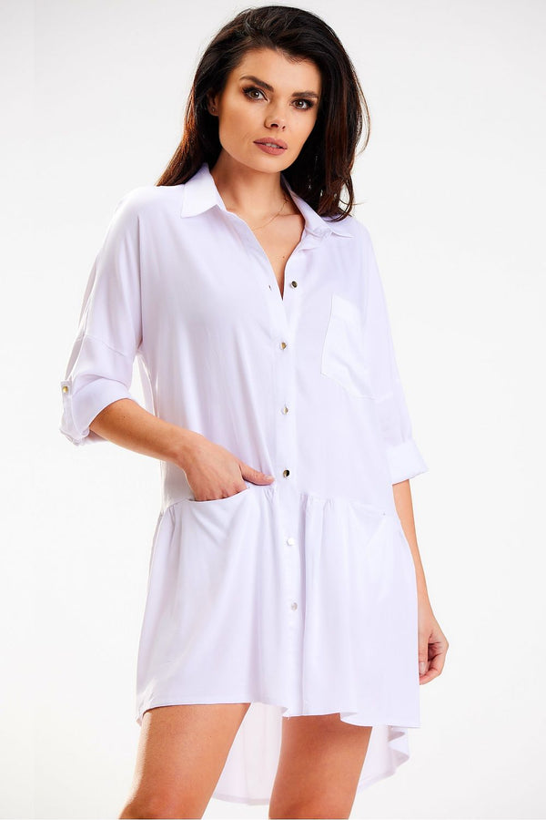 Elevate your style with the Chic Long Sleeve Midi Dress with Buttoned Roll-Up Sleeves, perfect for any occasion.