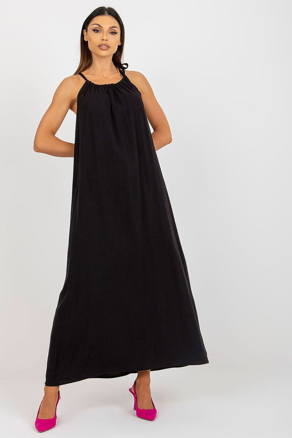 Stylish Casual Sleeveless Maxi Dress with a Loose Cut on Tied Straps, perfect for warm summer days. Elevate your wardrobe!