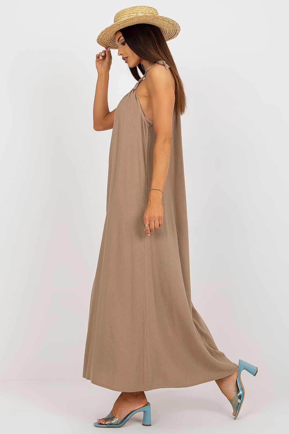 Stylish woman in a Casual Sleeveless Maxi Dress with a Loose Cut on Tied Straps, perfect for summer days.