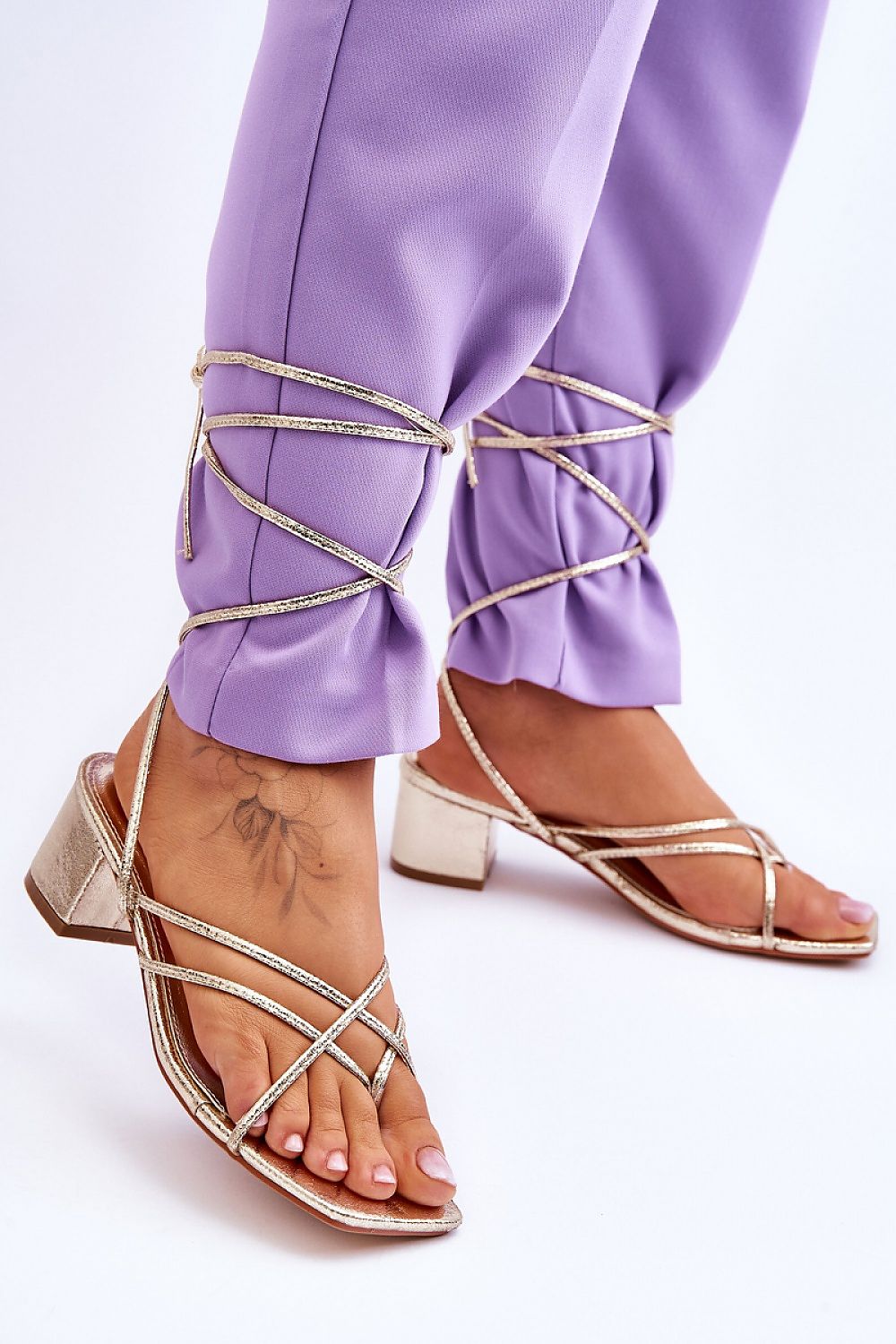 Stylish Strappy Low Heel Sandals for Women, perfect for summer outfits with airy comfort and trendy design.