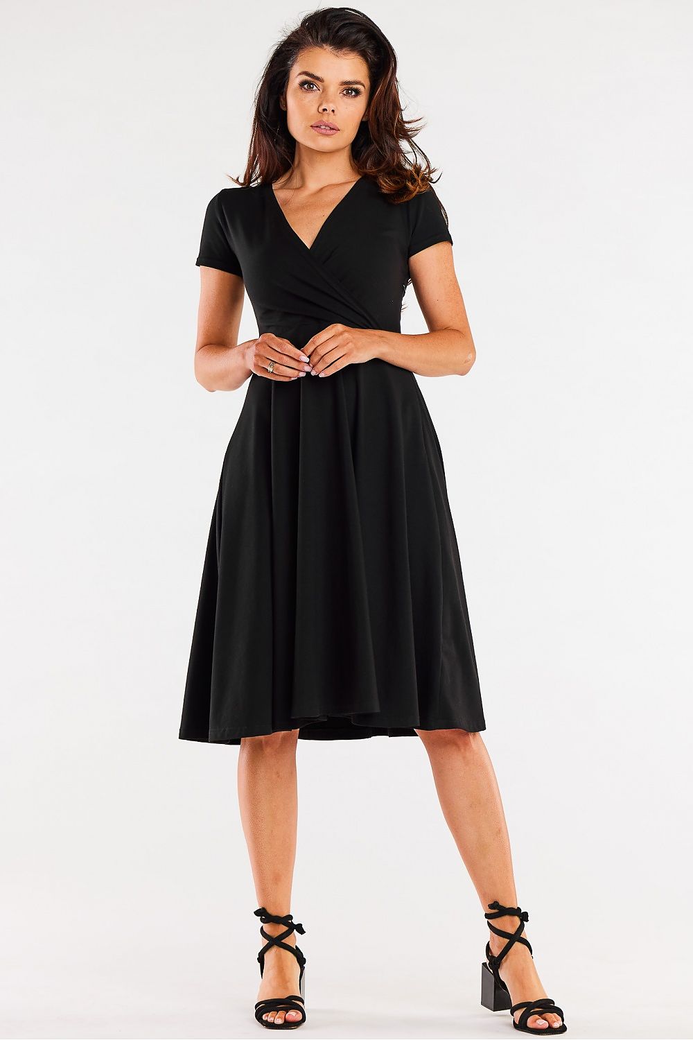 Stylish woman wearing a Cotton Short Sleeve Midi Dress for Effortless Style, showcasing elegance and comfort.